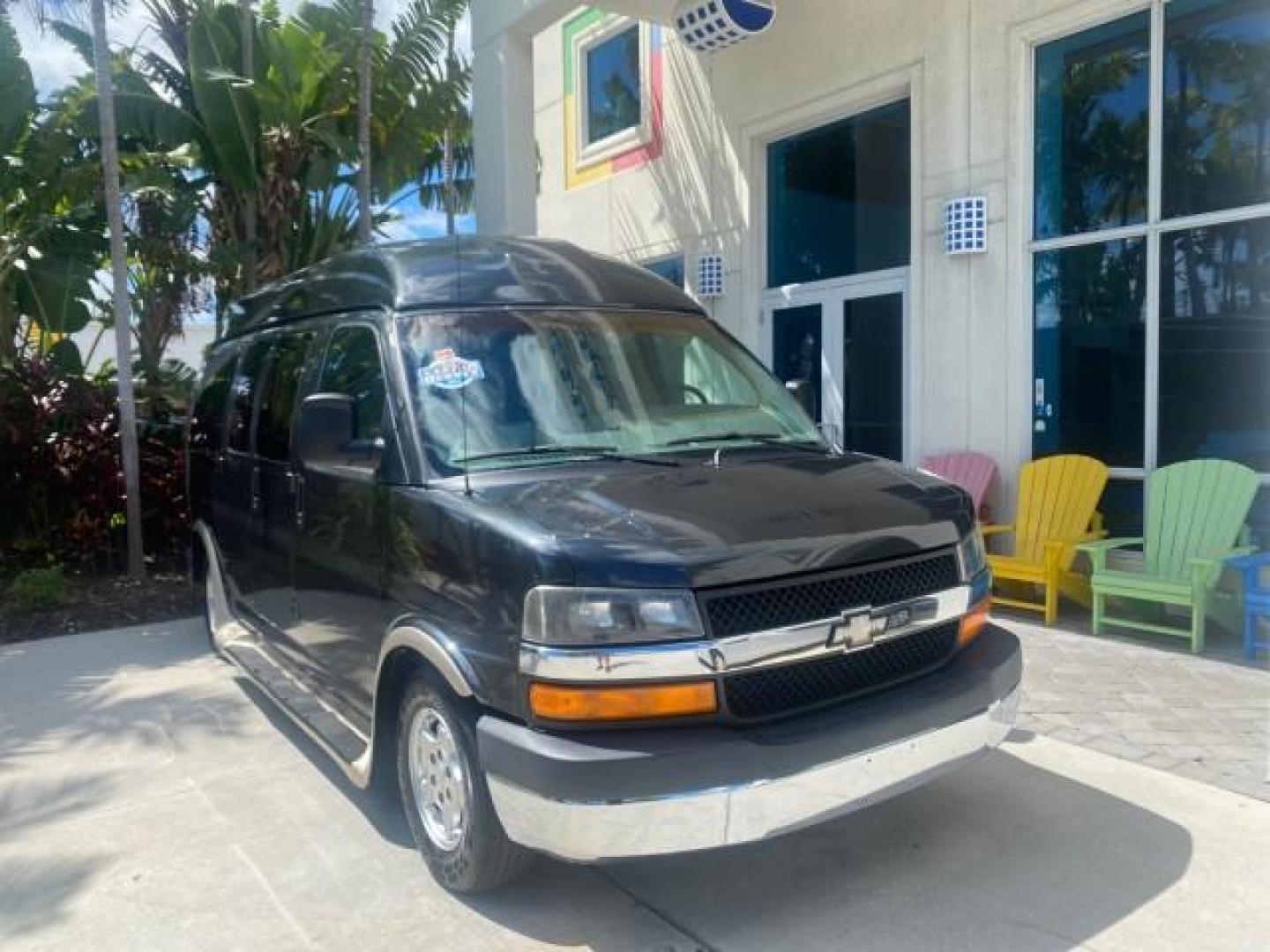 2004 Black /Medium Dark Pewter Chevrolet Express HANDICAP LIFT 1 OWNER FLORIDA HIGH TOP CONV VAN (1GBFG15T441) with an 5.3L Vortec 5300 V8 SFI Engine engine, Automatic transmission, located at 4701 North Dixie Hwy, Pompano Beach, FL, 33064, (954) 422-2889, 26.240938, -80.123474 - OUR WEBPAGE FLORIDACARS1.COM HAS OVER 100 PHOTOS AND FREE CARFAX LINK 2004 CHEVROLET EXPRESS G1500 HIGH TOP CONVERSION VAN WITH HANDICAP RAMP/LIFT VIN: 1GBFG15T441124744 THIS VAN COSTS $85,000 BRAND NEW WITH THE HANDICAP RAMP 1 G B F G 1 5 T 4 4 1 1 2 4 7 4 4 VAN 5.3L V8 F GASOLINE REAR WHEEL DRIVE - Photo#1