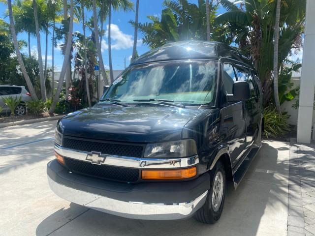 2004 Black /Medium Dark Pewter Chevrolet Express HANDICAP LIFT 1 OWNER FLORIDA HIGH TOP CONV VAN (1GBFG15T441) with an 5.3L Vortec 5300 V8 SFI Engine engine, Automatic transmission, located at 4701 North Dixie Hwy, Pompano Beach, FL, 33064, (954) 422-2889, 26.240938, -80.123474 - OUR WEBPAGE FLORIDACARS1.COM HAS OVER 100 PHOTOS AND FREE CARFAX LINK 2004 CHEVROLET EXPRESS G1500 HIGH TOP CONVERSION VAN WITH HANDICAP RAMP/LIFT VIN: 1GBFG15T441124744 THIS VAN COSTS $85,000 BRAND NEW WITH THE HANDICAP RAMP 1 G B F G 1 5 T 4 4 1 1 2 4 7 4 4 VAN 5.3L V8 F GASOLINE REAR WHEEL DRIVE - Photo#3