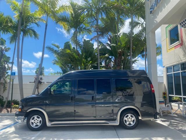 2004 Black /Medium Dark Pewter Chevrolet Express HANDICAP LIFT 1 OWNER FLORIDA HIGH TOP CONV VAN (1GBFG15T441) with an 5.3L Vortec 5300 V8 SFI Engine engine, Automatic transmission, located at 4701 North Dixie Hwy, Pompano Beach, FL, 33064, (954) 422-2889, 26.240938, -80.123474 - OUR WEBPAGE FLORIDACARS1.COM HAS OVER 100 PHOTOS AND FREE CARFAX LINK 2004 CHEVROLET EXPRESS G1500 HIGH TOP CONVERSION VAN WITH HANDICAP RAMP/LIFT VIN: 1GBFG15T441124744 THIS VAN COSTS $85,000 BRAND NEW WITH THE HANDICAP RAMP 1 G B F G 1 5 T 4 4 1 1 2 4 7 4 4 VAN 5.3L V8 F GASOLINE REAR WHEEL DRIVE - Photo#4