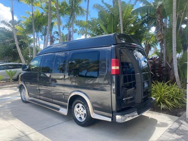 2004 Black /Medium Dark Pewter Chevrolet Express HANDICAP LIFT 1 OWNER FLORIDA HIGH TOP CONV VAN (1GBFG15T441) with an 5.3L Vortec 5300 V8 SFI Engine engine, Automatic transmission, located at 4701 North Dixie Hwy, Pompano Beach, FL, 33064, (954) 422-2889, 26.240938, -80.123474 - OUR WEBPAGE FLORIDACARS1.COM HAS OVER 100 PHOTOS AND FREE CARFAX LINK 2004 CHEVROLET EXPRESS G1500 HIGH TOP CONVERSION VAN WITH HANDICAP RAMP/LIFT VIN: 1GBFG15T441124744 THIS VAN COSTS $85,000 BRAND NEW WITH THE HANDICAP RAMP 1 G B F G 1 5 T 4 4 1 1 2 4 7 4 4 VAN 5.3L V8 F GASOLINE REAR WHEEL DRIVE - Photo#5