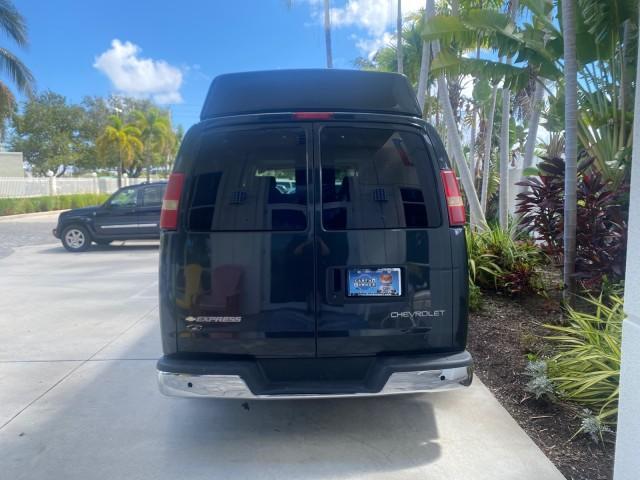 2004 Black /Medium Dark Pewter Chevrolet Express HANDICAP LIFT 1 OWNER FLORIDA HIGH TOP CONV VAN (1GBFG15T441) with an 5.3L Vortec 5300 V8 SFI Engine engine, Automatic transmission, located at 4701 North Dixie Hwy, Pompano Beach, FL, 33064, (954) 422-2889, 26.240938, -80.123474 - OUR WEBPAGE FLORIDACARS1.COM HAS OVER 100 PHOTOS AND FREE CARFAX LINK 2004 CHEVROLET EXPRESS G1500 HIGH TOP CONVERSION VAN WITH HANDICAP RAMP/LIFT VIN: 1GBFG15T441124744 THIS VAN COSTS $85,000 BRAND NEW WITH THE HANDICAP RAMP 1 G B F G 1 5 T 4 4 1 1 2 4 7 4 4 VAN 5.3L V8 F GASOLINE REAR WHEEL DRIVE - Photo#6