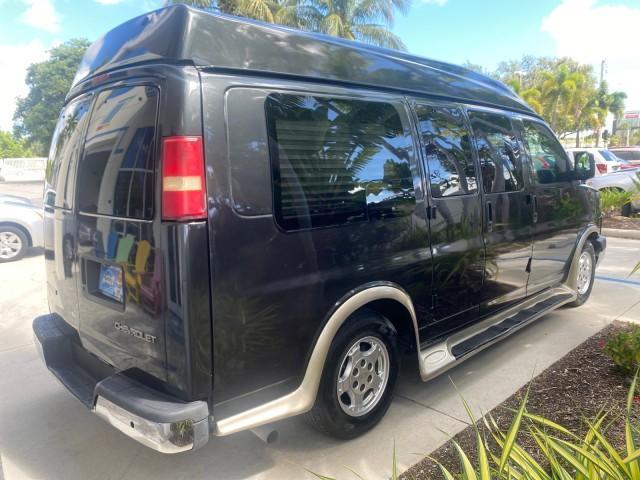 2004 Black /Medium Dark Pewter Chevrolet Express HANDICAP LIFT 1 OWNER FLORIDA HIGH TOP CONV VAN (1GBFG15T441) with an 5.3L Vortec 5300 V8 SFI Engine engine, Automatic transmission, located at 4701 North Dixie Hwy, Pompano Beach, FL, 33064, (954) 422-2889, 26.240938, -80.123474 - OUR WEBPAGE FLORIDACARS1.COM HAS OVER 100 PHOTOS AND FREE CARFAX LINK 2004 CHEVROLET EXPRESS G1500 HIGH TOP CONVERSION VAN WITH HANDICAP RAMP/LIFT VIN: 1GBFG15T441124744 THIS VAN COSTS $85,000 BRAND NEW WITH THE HANDICAP RAMP 1 G B F G 1 5 T 4 4 1 1 2 4 7 4 4 VAN 5.3L V8 F GASOLINE REAR WHEEL DRIVE - Photo#7