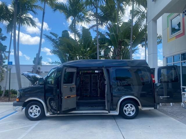 2004 Black /Medium Dark Pewter Chevrolet Express HANDICAP LIFT 1 OWNER FLORIDA HIGH TOP CONV VAN (1GBFG15T441) with an 5.3L Vortec 5300 V8 SFI Engine engine, Automatic transmission, located at 4701 North Dixie Hwy, Pompano Beach, FL, 33064, (954) 422-2889, 26.240938, -80.123474 - OUR WEBPAGE FLORIDACARS1.COM HAS OVER 100 PHOTOS AND FREE CARFAX LINK 2004 CHEVROLET EXPRESS G1500 HIGH TOP CONVERSION VAN WITH HANDICAP RAMP/LIFT VIN: 1GBFG15T441124744 THIS VAN COSTS $85,000 BRAND NEW WITH THE HANDICAP RAMP 1 G B F G 1 5 T 4 4 1 1 2 4 7 4 4 VAN 5.3L V8 F GASOLINE REAR WHEEL DRIVE - Photo#8