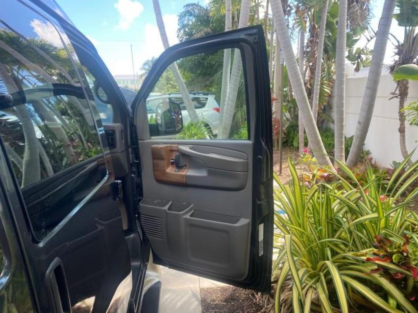 2004 Black /Medium Dark Pewter Chevrolet Express HANDICAP LIFT 1 OWNER FLORIDA HIGH TOP CONV VAN (1GBFG15T441) with an 5.3L Vortec 5300 V8 SFI Engine engine, Automatic transmission, located at 4701 North Dixie Hwy, Pompano Beach, FL, 33064, (954) 422-2889, 26.240938, -80.123474 - OUR WEBPAGE FLORIDACARS1.COM HAS OVER 100 PHOTOS AND FREE CARFAX LINK 2004 CHEVROLET EXPRESS G1500 HIGH TOP CONVERSION VAN WITH HANDICAP RAMP/LIFT VIN: 1GBFG15T441124744 THIS VAN COSTS $85,000 BRAND NEW WITH THE HANDICAP RAMP 1 G B F G 1 5 T 4 4 1 1 2 4 7 4 4 VAN 5.3L V8 F GASOLINE REAR WHEEL DRIVE - Photo#11
