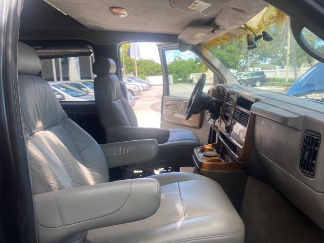 2004 Black /Medium Dark Pewter Chevrolet Express HANDICAP LIFT 1 OWNER FLORIDA HIGH TOP CONV VAN (1GBFG15T441) with an 5.3L Vortec 5300 V8 SFI Engine engine, Automatic transmission, located at 4701 North Dixie Hwy, Pompano Beach, FL, 33064, (954) 422-2889, 26.240938, -80.123474 - OUR WEBPAGE FLORIDACARS1.COM HAS OVER 100 PHOTOS AND FREE CARFAX LINK 2004 CHEVROLET EXPRESS G1500 HIGH TOP CONVERSION VAN WITH HANDICAP RAMP/LIFT VIN: 1GBFG15T441124744 THIS VAN COSTS $85,000 BRAND NEW WITH THE HANDICAP RAMP 1 G B F G 1 5 T 4 4 1 1 2 4 7 4 4 VAN 5.3L V8 F GASOLINE REAR WHEEL DRIVE - Photo#12