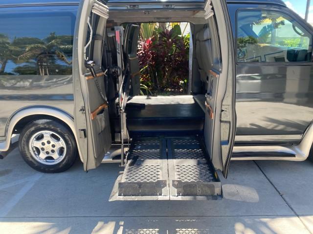 2004 Black /Medium Dark Pewter Chevrolet Express HANDICAP LIFT 1 OWNER FLORIDA HIGH TOP CONV VAN (1GBFG15T441) with an 5.3L Vortec 5300 V8 SFI Engine engine, Automatic transmission, located at 4701 North Dixie Hwy, Pompano Beach, FL, 33064, (954) 422-2889, 26.240938, -80.123474 - OUR WEBPAGE FLORIDACARS1.COM HAS OVER 100 PHOTOS AND FREE CARFAX LINK 2004 CHEVROLET EXPRESS G1500 HIGH TOP CONVERSION VAN WITH HANDICAP RAMP/LIFT VIN: 1GBFG15T441124744 THIS VAN COSTS $85,000 BRAND NEW WITH THE HANDICAP RAMP 1 G B F G 1 5 T 4 4 1 1 2 4 7 4 4 VAN 5.3L V8 F GASOLINE REAR WHEEL DRIVE - Photo#14