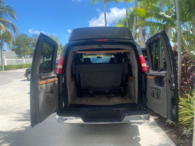 2004 Black /Medium Dark Pewter Chevrolet Express HANDICAP LIFT 1 OWNER FLORIDA HIGH TOP CONV VAN (1GBFG15T441) with an 5.3L Vortec 5300 V8 SFI Engine engine, Automatic transmission, located at 4701 North Dixie Hwy, Pompano Beach, FL, 33064, (954) 422-2889, 26.240938, -80.123474 - OUR WEBPAGE FLORIDACARS1.COM HAS OVER 100 PHOTOS AND FREE CARFAX LINK 2004 CHEVROLET EXPRESS G1500 HIGH TOP CONVERSION VAN WITH HANDICAP RAMP/LIFT VIN: 1GBFG15T441124744 THIS VAN COSTS $85,000 BRAND NEW WITH THE HANDICAP RAMP 1 G B F G 1 5 T 4 4 1 1 2 4 7 4 4 VAN 5.3L V8 F GASOLINE REAR WHEEL DRIVE - Photo#15