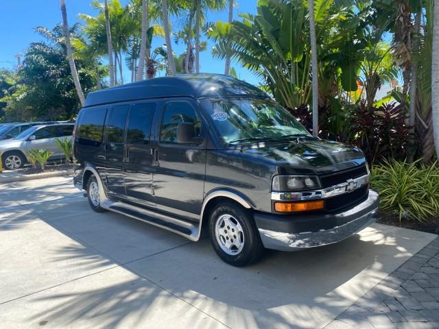 2004 Black /Medium Dark Pewter Chevrolet Express HANDICAP LIFT 1 OWNER FLORIDA HIGH TOP CONV VAN (1GBFG15T441) with an 5.3L Vortec 5300 V8 SFI Engine engine, Automatic transmission, located at 4701 North Dixie Hwy, Pompano Beach, FL, 33064, (954) 422-2889, 26.240938, -80.123474 - OUR WEBPAGE FLORIDACARS1.COM HAS OVER 100 PHOTOS AND FREE CARFAX LINK 2004 CHEVROLET EXPRESS G1500 HIGH TOP CONVERSION VAN WITH HANDICAP RAMP/LIFT VIN: 1GBFG15T441124744 THIS VAN COSTS $85,000 BRAND NEW WITH THE HANDICAP RAMP 1 G B F G 1 5 T 4 4 1 1 2 4 7 4 4 VAN 5.3L V8 F GASOLINE REAR WHEEL DRIVE - Photo#24