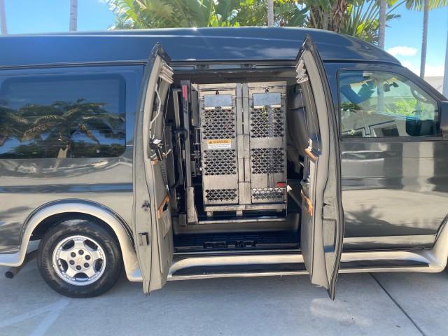 2004 Black /Medium Dark Pewter Chevrolet Express HANDICAP LIFT 1 OWNER FLORIDA HIGH TOP CONV VAN (1GBFG15T441) with an 5.3L Vortec 5300 V8 SFI Engine engine, Automatic transmission, located at 4701 North Dixie Hwy, Pompano Beach, FL, 33064, (954) 422-2889, 26.240938, -80.123474 - OUR WEBPAGE FLORIDACARS1.COM HAS OVER 100 PHOTOS AND FREE CARFAX LINK 2004 CHEVROLET EXPRESS G1500 HIGH TOP CONVERSION VAN WITH HANDICAP RAMP/LIFT VIN: 1GBFG15T441124744 THIS VAN COSTS $85,000 BRAND NEW WITH THE HANDICAP RAMP 1 G B F G 1 5 T 4 4 1 1 2 4 7 4 4 VAN 5.3L V8 F GASOLINE REAR WHEEL DRIVE - Photo#30