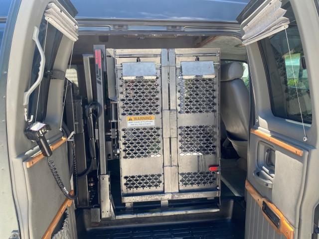 2004 Black /Medium Dark Pewter Chevrolet Express HANDICAP LIFT 1 OWNER FLORIDA HIGH TOP CONV VAN (1GBFG15T441) with an 5.3L Vortec 5300 V8 SFI Engine engine, Automatic transmission, located at 4701 North Dixie Hwy, Pompano Beach, FL, 33064, (954) 422-2889, 26.240938, -80.123474 - OUR WEBPAGE FLORIDACARS1.COM HAS OVER 100 PHOTOS AND FREE CARFAX LINK 2004 CHEVROLET EXPRESS G1500 HIGH TOP CONVERSION VAN WITH HANDICAP RAMP/LIFT VIN: 1GBFG15T441124744 THIS VAN COSTS $85,000 BRAND NEW WITH THE HANDICAP RAMP 1 G B F G 1 5 T 4 4 1 1 2 4 7 4 4 VAN 5.3L V8 F GASOLINE REAR WHEEL DRIVE - Photo#31