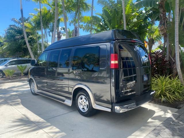 2004 Black /Medium Dark Pewter Chevrolet Express HANDICAP LIFT 1 OWNER FLORIDA HIGH TOP CONV VAN (1GBFG15T441) with an 5.3L Vortec 5300 V8 SFI Engine engine, Automatic transmission, located at 4701 North Dixie Hwy, Pompano Beach, FL, 33064, (954) 422-2889, 26.240938, -80.123474 - OUR WEBPAGE FLORIDACARS1.COM HAS OVER 100 PHOTOS AND FREE CARFAX LINK 2004 CHEVROLET EXPRESS G1500 HIGH TOP CONVERSION VAN WITH HANDICAP RAMP/LIFT VIN: 1GBFG15T441124744 THIS VAN COSTS $85,000 BRAND NEW WITH THE HANDICAP RAMP 1 G B F G 1 5 T 4 4 1 1 2 4 7 4 4 VAN 5.3L V8 F GASOLINE REAR WHEEL DRIVE - Photo#36