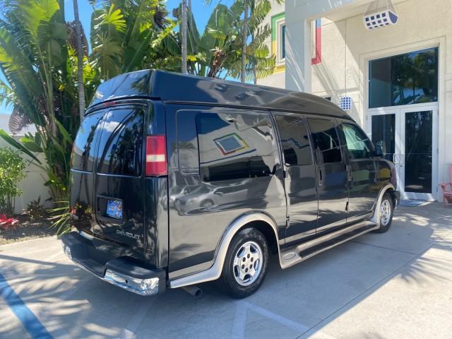 2004 Black /Medium Dark Pewter Chevrolet Express HANDICAP LIFT 1 OWNER FLORIDA HIGH TOP CONV VAN (1GBFG15T441) with an 5.3L Vortec 5300 V8 SFI Engine engine, Automatic transmission, located at 4701 North Dixie Hwy, Pompano Beach, FL, 33064, (954) 422-2889, 26.240938, -80.123474 - OUR WEBPAGE FLORIDACARS1.COM HAS OVER 100 PHOTOS AND FREE CARFAX LINK 2004 CHEVROLET EXPRESS G1500 HIGH TOP CONVERSION VAN WITH HANDICAP RAMP/LIFT VIN: 1GBFG15T441124744 THIS VAN COSTS $85,000 BRAND NEW WITH THE HANDICAP RAMP 1 G B F G 1 5 T 4 4 1 1 2 4 7 4 4 VAN 5.3L V8 F GASOLINE REAR WHEEL DRIVE - Photo#37