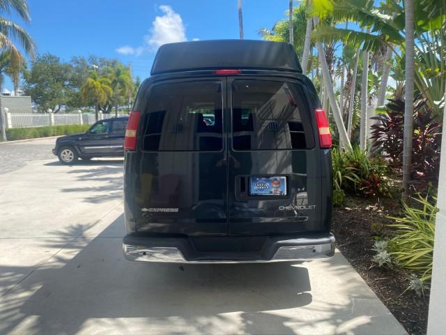 2004 Black /Medium Dark Pewter Chevrolet Express HANDICAP LIFT 1 OWNER FLORIDA HIGH TOP CONV VAN (1GBFG15T441) with an 5.3L Vortec 5300 V8 SFI Engine engine, Automatic transmission, located at 4701 North Dixie Hwy, Pompano Beach, FL, 33064, (954) 422-2889, 26.240938, -80.123474 - OUR WEBPAGE FLORIDACARS1.COM HAS OVER 100 PHOTOS AND FREE CARFAX LINK 2004 CHEVROLET EXPRESS G1500 HIGH TOP CONVERSION VAN WITH HANDICAP RAMP/LIFT VIN: 1GBFG15T441124744 THIS VAN COSTS $85,000 BRAND NEW WITH THE HANDICAP RAMP 1 G B F G 1 5 T 4 4 1 1 2 4 7 4 4 VAN 5.3L V8 F GASOLINE REAR WHEEL DRIVE - Photo#39