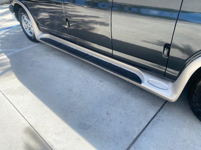 2004 Black /Medium Dark Pewter Chevrolet Express HANDICAP LIFT 1 OWNER FLORIDA HIGH TOP CONV VAN (1GBFG15T441) with an 5.3L Vortec 5300 V8 SFI Engine engine, Automatic transmission, located at 4701 North Dixie Hwy, Pompano Beach, FL, 33064, (954) 422-2889, 26.240938, -80.123474 - OUR WEBPAGE FLORIDACARS1.COM HAS OVER 100 PHOTOS AND FREE CARFAX LINK 2004 CHEVROLET EXPRESS G1500 HIGH TOP CONVERSION VAN WITH HANDICAP RAMP/LIFT VIN: 1GBFG15T441124744 THIS VAN COSTS $85,000 BRAND NEW WITH THE HANDICAP RAMP 1 G B F G 1 5 T 4 4 1 1 2 4 7 4 4 VAN 5.3L V8 F GASOLINE REAR WHEEL DRIVE - Photo#45