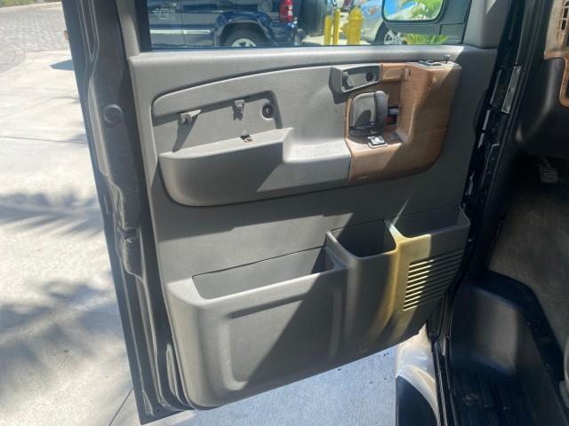 2004 Black /Medium Dark Pewter Chevrolet Express HANDICAP LIFT 1 OWNER FLORIDA HIGH TOP CONV VAN (1GBFG15T441) with an 5.3L Vortec 5300 V8 SFI Engine engine, Automatic transmission, located at 4701 North Dixie Hwy, Pompano Beach, FL, 33064, (954) 422-2889, 26.240938, -80.123474 - OUR WEBPAGE FLORIDACARS1.COM HAS OVER 100 PHOTOS AND FREE CARFAX LINK 2004 CHEVROLET EXPRESS G1500 HIGH TOP CONVERSION VAN WITH HANDICAP RAMP/LIFT VIN: 1GBFG15T441124744 THIS VAN COSTS $85,000 BRAND NEW WITH THE HANDICAP RAMP 1 G B F G 1 5 T 4 4 1 1 2 4 7 4 4 VAN 5.3L V8 F GASOLINE REAR WHEEL DRIVE - Photo#46