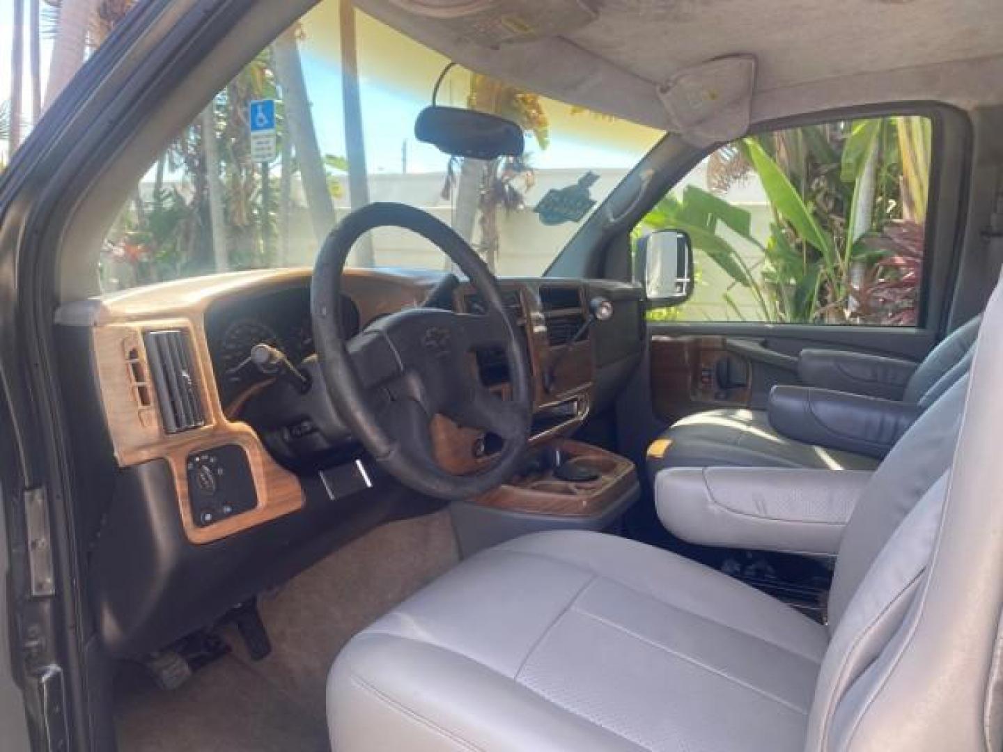 2004 Black /Medium Dark Pewter Chevrolet Express HANDICAP LIFT 1 OWNER FLORIDA HIGH TOP CONV VAN (1GBFG15T441) with an 5.3L Vortec 5300 V8 SFI Engine engine, Automatic transmission, located at 4701 North Dixie Hwy, Pompano Beach, FL, 33064, (954) 422-2889, 26.240938, -80.123474 - OUR WEBPAGE FLORIDACARS1.COM HAS OVER 100 PHOTOS AND FREE CARFAX LINK 2004 CHEVROLET EXPRESS G1500 HIGH TOP CONVERSION VAN WITH HANDICAP RAMP/LIFT VIN: 1GBFG15T441124744 THIS VAN COSTS $85,000 BRAND NEW WITH THE HANDICAP RAMP 1 G B F G 1 5 T 4 4 1 1 2 4 7 4 4 VAN 5.3L V8 F GASOLINE REAR WHEEL DRIVE - Photo#51