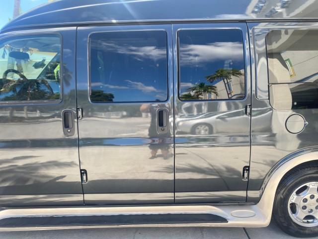 2004 Black /Medium Dark Pewter Chevrolet Express HANDICAP LIFT 1 OWNER FLORIDA HIGH TOP CONV VAN (1GBFG15T441) with an 5.3L Vortec 5300 V8 SFI Engine engine, Automatic transmission, located at 4701 North Dixie Hwy, Pompano Beach, FL, 33064, (954) 422-2889, 26.240938, -80.123474 - OUR WEBPAGE FLORIDACARS1.COM HAS OVER 100 PHOTOS AND FREE CARFAX LINK 2004 CHEVROLET EXPRESS G1500 HIGH TOP CONVERSION VAN WITH HANDICAP RAMP/LIFT VIN: 1GBFG15T441124744 THIS VAN COSTS $85,000 BRAND NEW WITH THE HANDICAP RAMP 1 G B F G 1 5 T 4 4 1 1 2 4 7 4 4 VAN 5.3L V8 F GASOLINE REAR WHEEL DRIVE - Photo#69