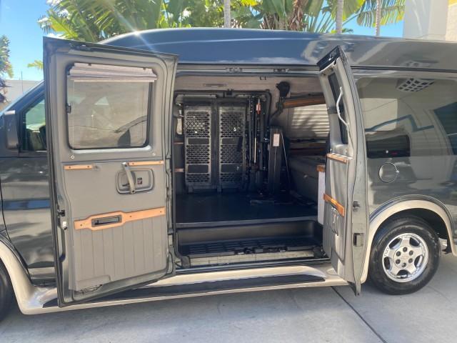 2004 Black /Medium Dark Pewter Chevrolet Express HANDICAP LIFT 1 OWNER FLORIDA HIGH TOP CONV VAN (1GBFG15T441) with an 5.3L Vortec 5300 V8 SFI Engine engine, Automatic transmission, located at 4701 North Dixie Hwy, Pompano Beach, FL, 33064, (954) 422-2889, 26.240938, -80.123474 - OUR WEBPAGE FLORIDACARS1.COM HAS OVER 100 PHOTOS AND FREE CARFAX LINK 2004 CHEVROLET EXPRESS G1500 HIGH TOP CONVERSION VAN WITH HANDICAP RAMP/LIFT VIN: 1GBFG15T441124744 THIS VAN COSTS $85,000 BRAND NEW WITH THE HANDICAP RAMP 1 G B F G 1 5 T 4 4 1 1 2 4 7 4 4 VAN 5.3L V8 F GASOLINE REAR WHEEL DRIVE - Photo#70