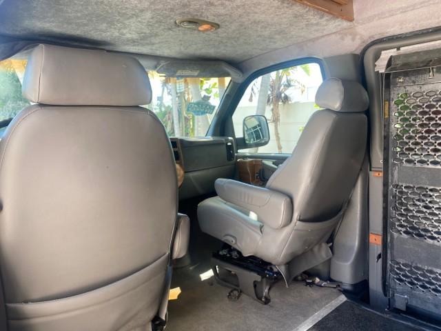 2004 Black /Medium Dark Pewter Chevrolet Express HANDICAP LIFT 1 OWNER FLORIDA HIGH TOP CONV VAN (1GBFG15T441) with an 5.3L Vortec 5300 V8 SFI Engine engine, Automatic transmission, located at 4701 North Dixie Hwy, Pompano Beach, FL, 33064, (954) 422-2889, 26.240938, -80.123474 - OUR WEBPAGE FLORIDACARS1.COM HAS OVER 100 PHOTOS AND FREE CARFAX LINK 2004 CHEVROLET EXPRESS G1500 HIGH TOP CONVERSION VAN WITH HANDICAP RAMP/LIFT VIN: 1GBFG15T441124744 THIS VAN COSTS $85,000 BRAND NEW WITH THE HANDICAP RAMP 1 G B F G 1 5 T 4 4 1 1 2 4 7 4 4 VAN 5.3L V8 F GASOLINE REAR WHEEL DRIVE - Photo#75