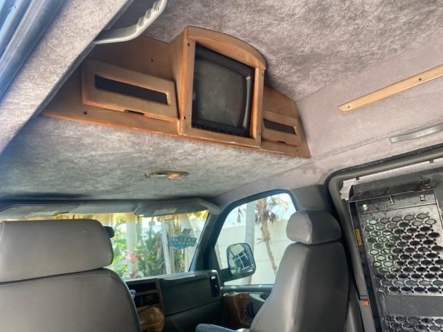 2004 Black /Medium Dark Pewter Chevrolet Express HANDICAP LIFT 1 OWNER FLORIDA HIGH TOP CONV VAN (1GBFG15T441) with an 5.3L Vortec 5300 V8 SFI Engine engine, Automatic transmission, located at 4701 North Dixie Hwy, Pompano Beach, FL, 33064, (954) 422-2889, 26.240938, -80.123474 - OUR WEBPAGE FLORIDACARS1.COM HAS OVER 100 PHOTOS AND FREE CARFAX LINK 2004 CHEVROLET EXPRESS G1500 HIGH TOP CONVERSION VAN WITH HANDICAP RAMP/LIFT VIN: 1GBFG15T441124744 THIS VAN COSTS $85,000 BRAND NEW WITH THE HANDICAP RAMP 1 G B F G 1 5 T 4 4 1 1 2 4 7 4 4 VAN 5.3L V8 F GASOLINE REAR WHEEL DRIVE - Photo#76
