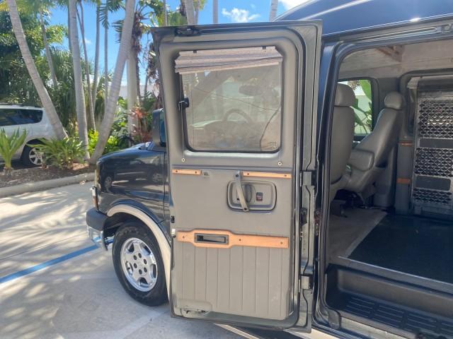 2004 Black /Medium Dark Pewter Chevrolet Express HANDICAP LIFT 1 OWNER FLORIDA HIGH TOP CONV VAN (1GBFG15T441) with an 5.3L Vortec 5300 V8 SFI Engine engine, Automatic transmission, located at 4701 North Dixie Hwy, Pompano Beach, FL, 33064, (954) 422-2889, 26.240938, -80.123474 - OUR WEBPAGE FLORIDACARS1.COM HAS OVER 100 PHOTOS AND FREE CARFAX LINK 2004 CHEVROLET EXPRESS G1500 HIGH TOP CONVERSION VAN WITH HANDICAP RAMP/LIFT VIN: 1GBFG15T441124744 THIS VAN COSTS $85,000 BRAND NEW WITH THE HANDICAP RAMP 1 G B F G 1 5 T 4 4 1 1 2 4 7 4 4 VAN 5.3L V8 F GASOLINE REAR WHEEL DRIVE - Photo#78