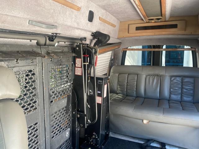 2004 Black /Medium Dark Pewter Chevrolet Express HANDICAP LIFT 1 OWNER FLORIDA HIGH TOP CONV VAN (1GBFG15T441) with an 5.3L Vortec 5300 V8 SFI Engine engine, Automatic transmission, located at 4701 North Dixie Hwy, Pompano Beach, FL, 33064, (954) 422-2889, 26.240938, -80.123474 - OUR WEBPAGE FLORIDACARS1.COM HAS OVER 100 PHOTOS AND FREE CARFAX LINK 2004 CHEVROLET EXPRESS G1500 HIGH TOP CONVERSION VAN WITH HANDICAP RAMP/LIFT VIN: 1GBFG15T441124744 THIS VAN COSTS $85,000 BRAND NEW WITH THE HANDICAP RAMP 1 G B F G 1 5 T 4 4 1 1 2 4 7 4 4 VAN 5.3L V8 F GASOLINE REAR WHEEL DRIVE - Photo#80