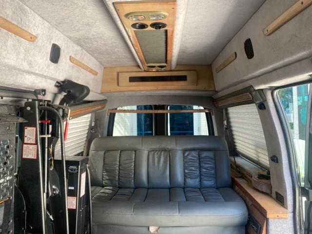 2004 Black /Medium Dark Pewter Chevrolet Express HANDICAP LIFT 1 OWNER FLORIDA HIGH TOP CONV VAN (1GBFG15T441) with an 5.3L Vortec 5300 V8 SFI Engine engine, Automatic transmission, located at 4701 North Dixie Hwy, Pompano Beach, FL, 33064, (954) 422-2889, 26.240938, -80.123474 - OUR WEBPAGE FLORIDACARS1.COM HAS OVER 100 PHOTOS AND FREE CARFAX LINK 2004 CHEVROLET EXPRESS G1500 HIGH TOP CONVERSION VAN WITH HANDICAP RAMP/LIFT VIN: 1GBFG15T441124744 THIS VAN COSTS $85,000 BRAND NEW WITH THE HANDICAP RAMP 1 G B F G 1 5 T 4 4 1 1 2 4 7 4 4 VAN 5.3L V8 F GASOLINE REAR WHEEL DRIVE - Photo#81
