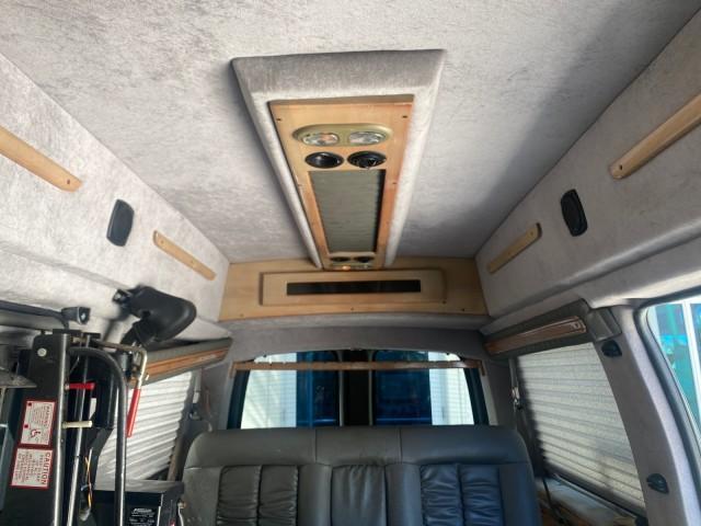 2004 Black /Medium Dark Pewter Chevrolet Express HANDICAP LIFT 1 OWNER FLORIDA HIGH TOP CONV VAN (1GBFG15T441) with an 5.3L Vortec 5300 V8 SFI Engine engine, Automatic transmission, located at 4701 North Dixie Hwy, Pompano Beach, FL, 33064, (954) 422-2889, 26.240938, -80.123474 - OUR WEBPAGE FLORIDACARS1.COM HAS OVER 100 PHOTOS AND FREE CARFAX LINK 2004 CHEVROLET EXPRESS G1500 HIGH TOP CONVERSION VAN WITH HANDICAP RAMP/LIFT VIN: 1GBFG15T441124744 THIS VAN COSTS $85,000 BRAND NEW WITH THE HANDICAP RAMP 1 G B F G 1 5 T 4 4 1 1 2 4 7 4 4 VAN 5.3L V8 F GASOLINE REAR WHEEL DRIVE - Photo#83