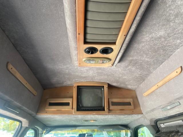 2004 Black /Medium Dark Pewter Chevrolet Express HANDICAP LIFT 1 OWNER FLORIDA HIGH TOP CONV VAN (1GBFG15T441) with an 5.3L Vortec 5300 V8 SFI Engine engine, Automatic transmission, located at 4701 North Dixie Hwy, Pompano Beach, FL, 33064, (954) 422-2889, 26.240938, -80.123474 - OUR WEBPAGE FLORIDACARS1.COM HAS OVER 100 PHOTOS AND FREE CARFAX LINK 2004 CHEVROLET EXPRESS G1500 HIGH TOP CONVERSION VAN WITH HANDICAP RAMP/LIFT VIN: 1GBFG15T441124744 THIS VAN COSTS $85,000 BRAND NEW WITH THE HANDICAP RAMP 1 G B F G 1 5 T 4 4 1 1 2 4 7 4 4 VAN 5.3L V8 F GASOLINE REAR WHEEL DRIVE - Photo#85