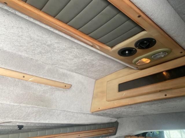 2004 Black /Medium Dark Pewter Chevrolet Express HANDICAP LIFT 1 OWNER FLORIDA HIGH TOP CONV VAN (1GBFG15T441) with an 5.3L Vortec 5300 V8 SFI Engine engine, Automatic transmission, located at 4701 North Dixie Hwy, Pompano Beach, FL, 33064, (954) 422-2889, 26.240938, -80.123474 - OUR WEBPAGE FLORIDACARS1.COM HAS OVER 100 PHOTOS AND FREE CARFAX LINK 2004 CHEVROLET EXPRESS G1500 HIGH TOP CONVERSION VAN WITH HANDICAP RAMP/LIFT VIN: 1GBFG15T441124744 THIS VAN COSTS $85,000 BRAND NEW WITH THE HANDICAP RAMP 1 G B F G 1 5 T 4 4 1 1 2 4 7 4 4 VAN 5.3L V8 F GASOLINE REAR WHEEL DRIVE - Photo#87