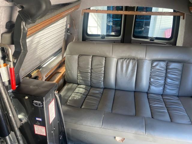 2004 Black /Medium Dark Pewter Chevrolet Express HANDICAP LIFT 1 OWNER FLORIDA HIGH TOP CONV VAN (1GBFG15T441) with an 5.3L Vortec 5300 V8 SFI Engine engine, Automatic transmission, located at 4701 North Dixie Hwy, Pompano Beach, FL, 33064, (954) 422-2889, 26.240938, -80.123474 - OUR WEBPAGE FLORIDACARS1.COM HAS OVER 100 PHOTOS AND FREE CARFAX LINK 2004 CHEVROLET EXPRESS G1500 HIGH TOP CONVERSION VAN WITH HANDICAP RAMP/LIFT VIN: 1GBFG15T441124744 THIS VAN COSTS $85,000 BRAND NEW WITH THE HANDICAP RAMP 1 G B F G 1 5 T 4 4 1 1 2 4 7 4 4 VAN 5.3L V8 F GASOLINE REAR WHEEL DRIVE - Photo#89