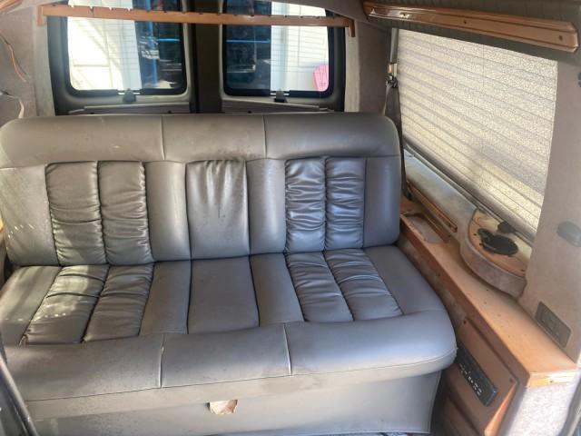 2004 Black /Medium Dark Pewter Chevrolet Express HANDICAP LIFT 1 OWNER FLORIDA HIGH TOP CONV VAN (1GBFG15T441) with an 5.3L Vortec 5300 V8 SFI Engine engine, Automatic transmission, located at 4701 North Dixie Hwy, Pompano Beach, FL, 33064, (954) 422-2889, 26.240938, -80.123474 - OUR WEBPAGE FLORIDACARS1.COM HAS OVER 100 PHOTOS AND FREE CARFAX LINK 2004 CHEVROLET EXPRESS G1500 HIGH TOP CONVERSION VAN WITH HANDICAP RAMP/LIFT VIN: 1GBFG15T441124744 THIS VAN COSTS $85,000 BRAND NEW WITH THE HANDICAP RAMP 1 G B F G 1 5 T 4 4 1 1 2 4 7 4 4 VAN 5.3L V8 F GASOLINE REAR WHEEL DRIVE - Photo#90