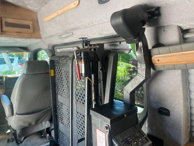 2004 Black /Medium Dark Pewter Chevrolet Express HANDICAP LIFT 1 OWNER FLORIDA HIGH TOP CONV VAN (1GBFG15T441) with an 5.3L Vortec 5300 V8 SFI Engine engine, Automatic transmission, located at 4701 North Dixie Hwy, Pompano Beach, FL, 33064, (954) 422-2889, 26.240938, -80.123474 - OUR WEBPAGE FLORIDACARS1.COM HAS OVER 100 PHOTOS AND FREE CARFAX LINK 2004 CHEVROLET EXPRESS G1500 HIGH TOP CONVERSION VAN WITH HANDICAP RAMP/LIFT VIN: 1GBFG15T441124744 THIS VAN COSTS $85,000 BRAND NEW WITH THE HANDICAP RAMP 1 G B F G 1 5 T 4 4 1 1 2 4 7 4 4 VAN 5.3L V8 F GASOLINE REAR WHEEL DRIVE - Photo#94