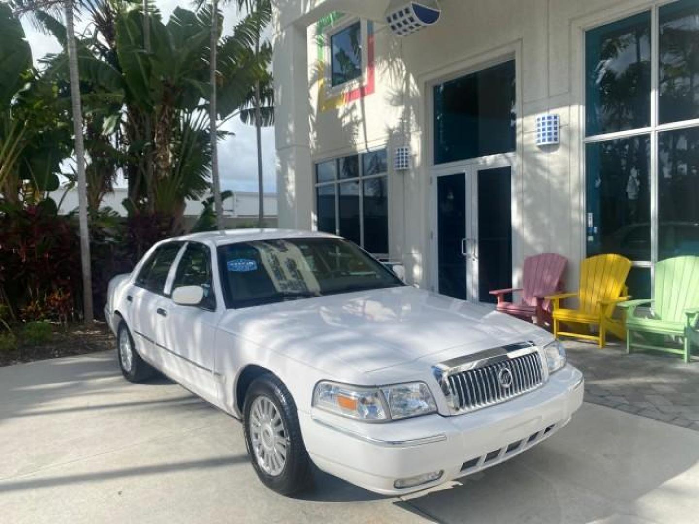 2007 Vibrant White /Med Light Stone Mercury Grand Marquis LS LOW MILES 62,205 (2MEFM75V17X) with an 4.6L SOHC FFV V8 Engine engine, Automatic transmission, located at 4701 North Dixie Hwy, Pompano Beach, FL, 33064, (954) 422-2889, 26.240938, -80.123474 - OUR WEBPAGE FLORIDACARS1.COM HAS OVER 100 PHOTOS AND FREE CARFAX LINK 2007 MERCURY GRAND MARQUIS LS VIN: 2MEFM75V17X635847 2 M E F M 7 5 V 1 7 X 6 3 5 8 4 7 SEDAN 4 DR 4.6L V8 F SOHC FLEX FUEL REAR WHEEL DRIVE Features ABS Brakes Air Conditioning Alloy Wheels AM/FM Stereo Automatic Transmission Cass - Photo#1