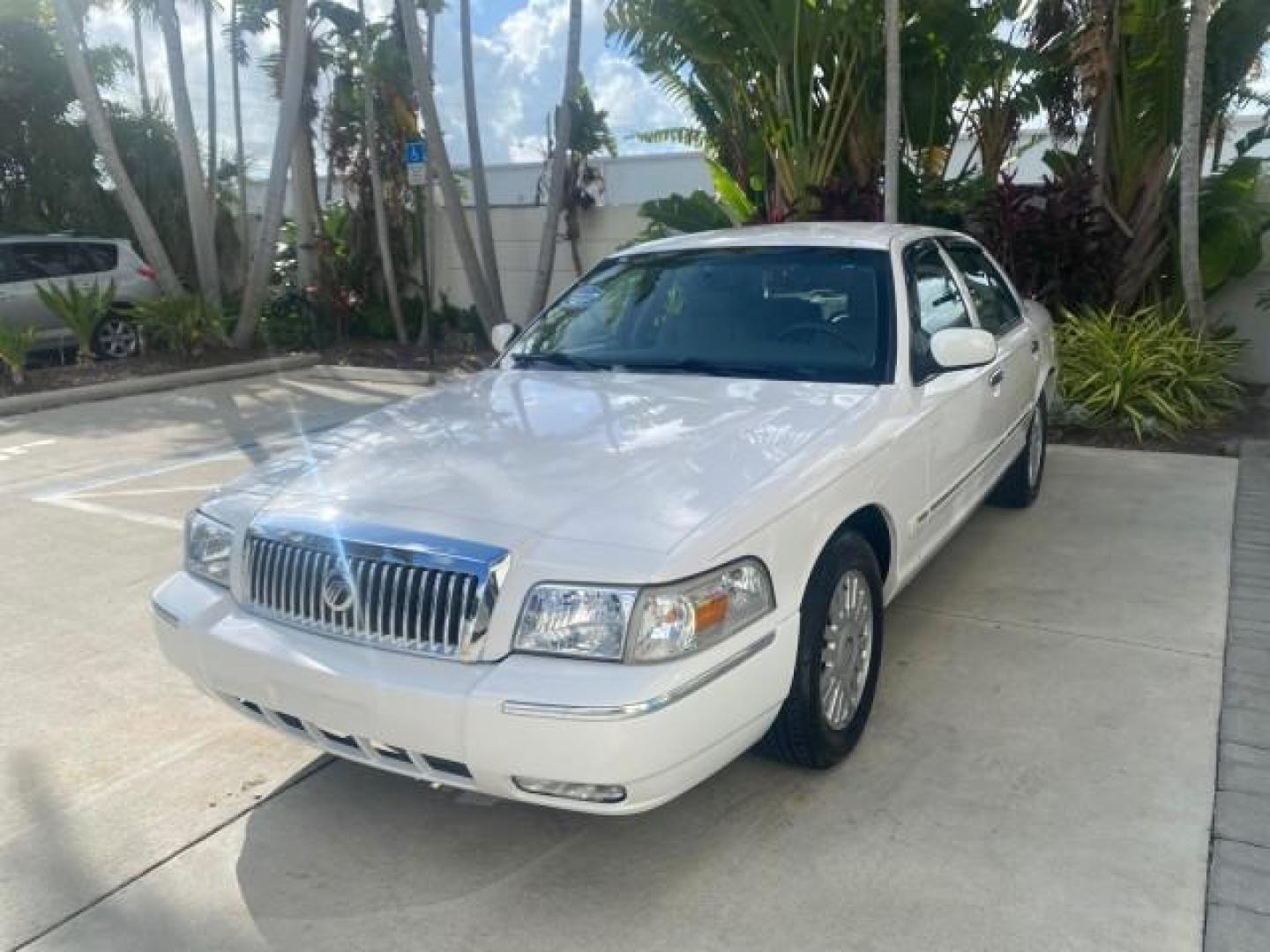 2007 Vibrant White /Med Light Stone Mercury Grand Marquis LS LOW MILES 62,205 (2MEFM75V17X) with an 4.6L SOHC FFV V8 Engine engine, Automatic transmission, located at 4701 North Dixie Hwy, Pompano Beach, FL, 33064, (954) 422-2889, 26.240938, -80.123474 - OUR WEBPAGE FLORIDACARS1.COM HAS OVER 100 PHOTOS AND FREE CARFAX LINK 2007 MERCURY GRAND MARQUIS LS VIN: 2MEFM75V17X635847 2 M E F M 7 5 V 1 7 X 6 3 5 8 4 7 SEDAN 4 DR 4.6L V8 F SOHC FLEX FUEL REAR WHEEL DRIVE Features ABS Brakes Air Conditioning Alloy Wheels AM/FM Stereo Automatic Transmission Cass - Photo#3