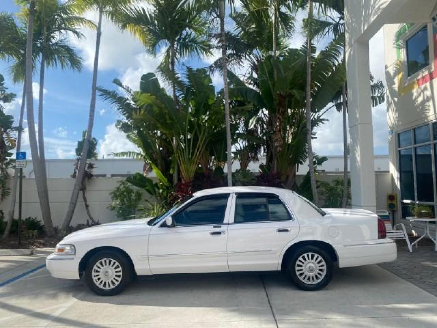 2007 Vibrant White /Med Light Stone Mercury Grand Marquis LS LOW MILES 62,205 (2MEFM75V17X) with an 4.6L SOHC FFV V8 Engine engine, Automatic transmission, located at 4701 North Dixie Hwy, Pompano Beach, FL, 33064, (954) 422-2889, 26.240938, -80.123474 - OUR WEBPAGE FLORIDACARS1.COM HAS OVER 100 PHOTOS AND FREE CARFAX LINK 2007 MERCURY GRAND MARQUIS LS VIN: 2MEFM75V17X635847 2 M E F M 7 5 V 1 7 X 6 3 5 8 4 7 SEDAN 4 DR 4.6L V8 F SOHC FLEX FUEL REAR WHEEL DRIVE Features ABS Brakes Air Conditioning Alloy Wheels AM/FM Stereo Automatic Transmission Cass - Photo#4