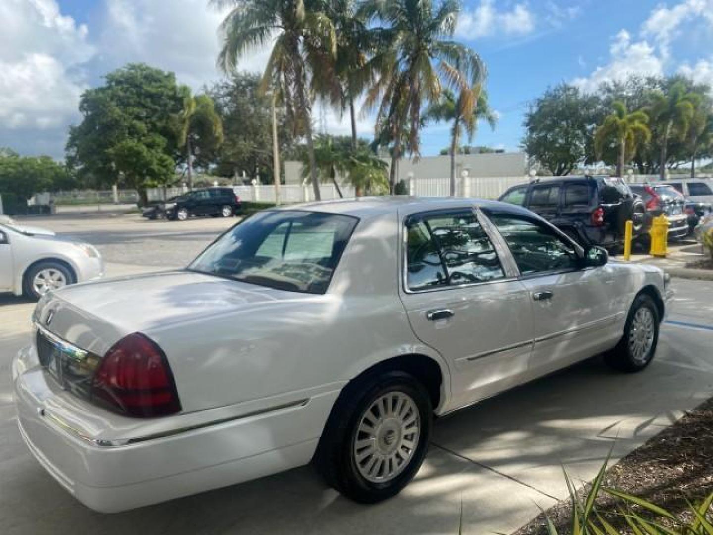 2007 Vibrant White /Med Light Stone Mercury Grand Marquis LS LOW MILES 62,205 (2MEFM75V17X) with an 4.6L SOHC FFV V8 Engine engine, Automatic transmission, located at 4701 North Dixie Hwy, Pompano Beach, FL, 33064, (954) 422-2889, 26.240938, -80.123474 - OUR WEBPAGE FLORIDACARS1.COM HAS OVER 100 PHOTOS AND FREE CARFAX LINK 2007 MERCURY GRAND MARQUIS LS VIN: 2MEFM75V17X635847 2 M E F M 7 5 V 1 7 X 6 3 5 8 4 7 SEDAN 4 DR 4.6L V8 F SOHC FLEX FUEL REAR WHEEL DRIVE Features ABS Brakes Air Conditioning Alloy Wheels AM/FM Stereo Automatic Transmission Cass - Photo#7