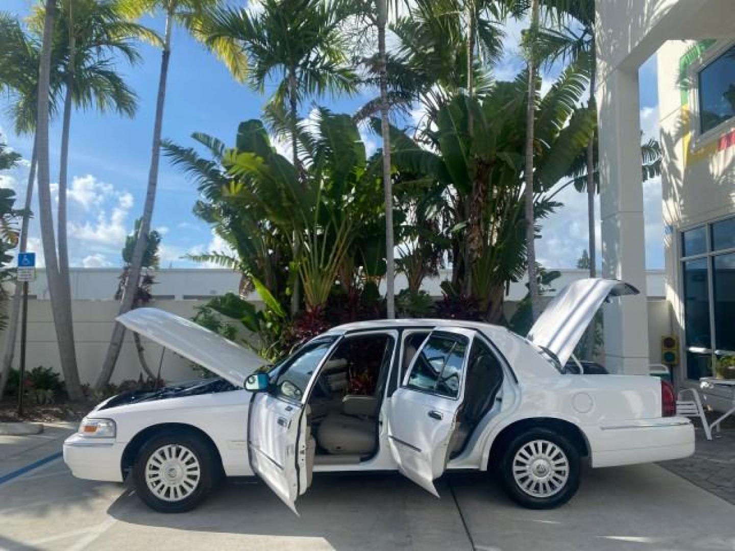 2007 Vibrant White /Med Light Stone Mercury Grand Marquis LS LOW MILES 62,205 (2MEFM75V17X) with an 4.6L SOHC FFV V8 Engine engine, Automatic transmission, located at 4701 North Dixie Hwy, Pompano Beach, FL, 33064, (954) 422-2889, 26.240938, -80.123474 - OUR WEBPAGE FLORIDACARS1.COM HAS OVER 100 PHOTOS AND FREE CARFAX LINK 2007 MERCURY GRAND MARQUIS LS VIN: 2MEFM75V17X635847 2 M E F M 7 5 V 1 7 X 6 3 5 8 4 7 SEDAN 4 DR 4.6L V8 F SOHC FLEX FUEL REAR WHEEL DRIVE Features ABS Brakes Air Conditioning Alloy Wheels AM/FM Stereo Automatic Transmission Cass - Photo#8