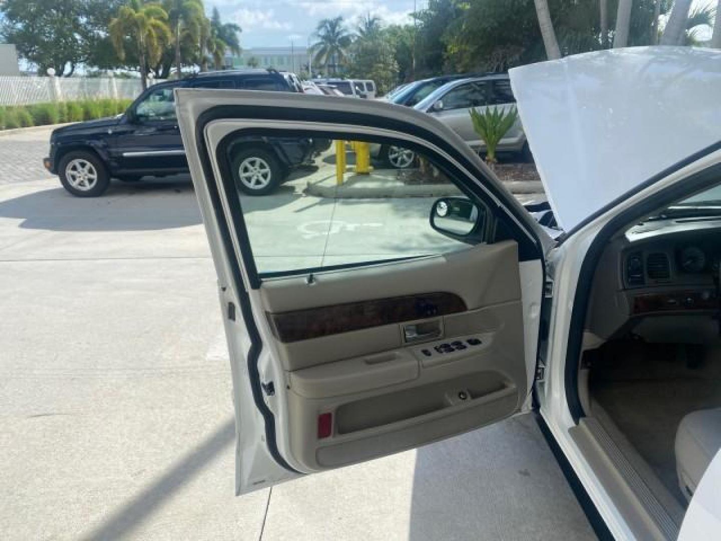 2007 Vibrant White /Med Light Stone Mercury Grand Marquis LS LOW MILES 62,205 (2MEFM75V17X) with an 4.6L SOHC FFV V8 Engine engine, Automatic transmission, located at 4701 North Dixie Hwy, Pompano Beach, FL, 33064, (954) 422-2889, 26.240938, -80.123474 - OUR WEBPAGE FLORIDACARS1.COM HAS OVER 100 PHOTOS AND FREE CARFAX LINK 2007 MERCURY GRAND MARQUIS LS VIN: 2MEFM75V17X635847 2 M E F M 7 5 V 1 7 X 6 3 5 8 4 7 SEDAN 4 DR 4.6L V8 F SOHC FLEX FUEL REAR WHEEL DRIVE Features ABS Brakes Air Conditioning Alloy Wheels AM/FM Stereo Automatic Transmission Cass - Photo#9