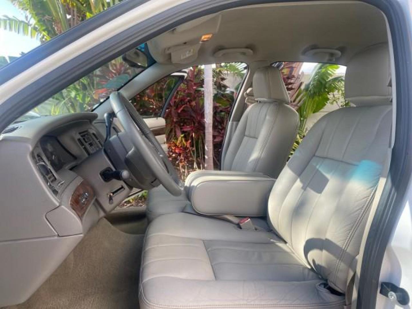 2007 Vibrant White /Med Light Stone Mercury Grand Marquis LS LOW MILES 62,205 (2MEFM75V17X) with an 4.6L SOHC FFV V8 Engine engine, Automatic transmission, located at 4701 North Dixie Hwy, Pompano Beach, FL, 33064, (954) 422-2889, 26.240938, -80.123474 - OUR WEBPAGE FLORIDACARS1.COM HAS OVER 100 PHOTOS AND FREE CARFAX LINK 2007 MERCURY GRAND MARQUIS LS VIN: 2MEFM75V17X635847 2 M E F M 7 5 V 1 7 X 6 3 5 8 4 7 SEDAN 4 DR 4.6L V8 F SOHC FLEX FUEL REAR WHEEL DRIVE Features ABS Brakes Air Conditioning Alloy Wheels AM/FM Stereo Automatic Transmission Cass - Photo#10