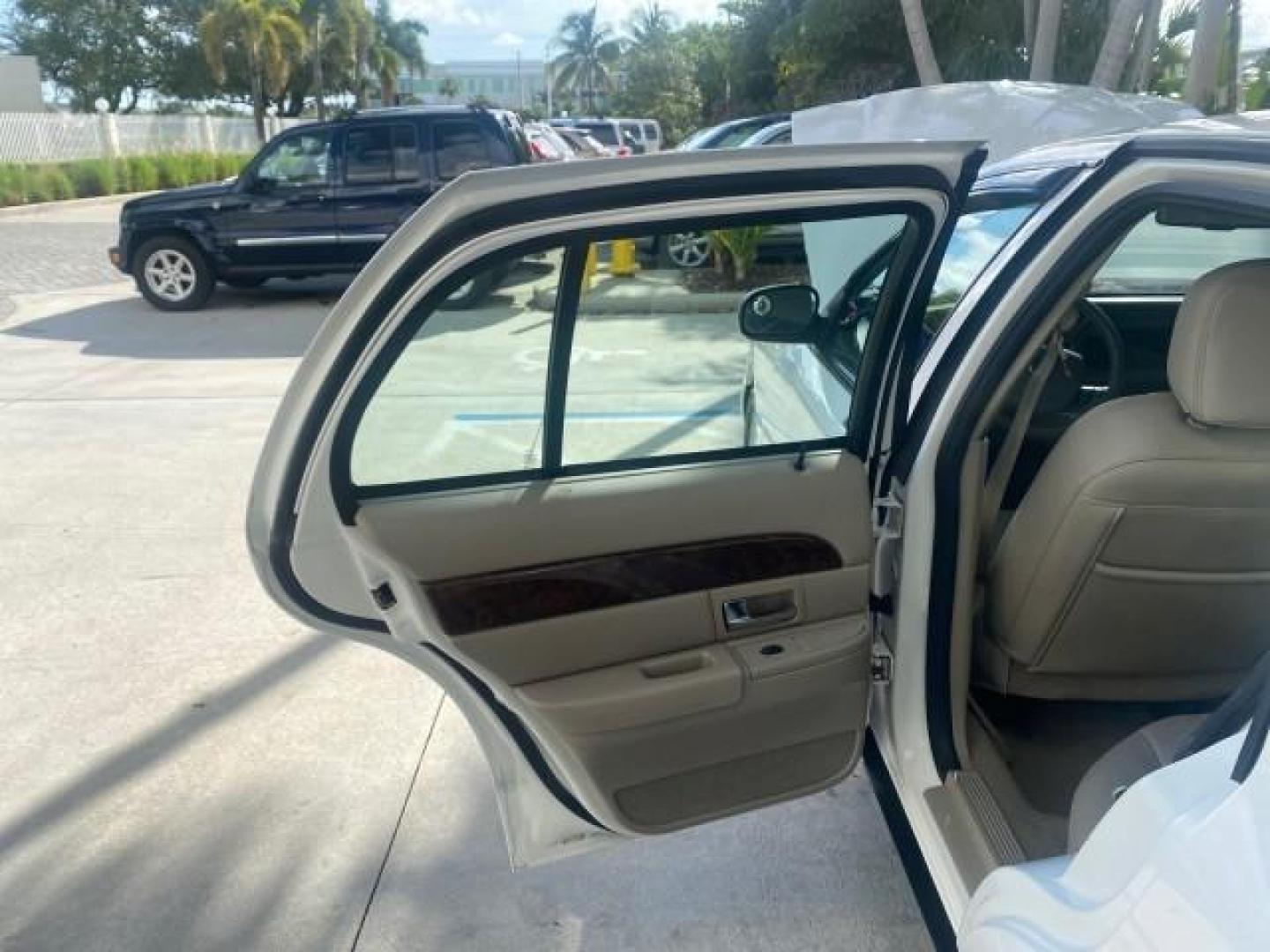 2007 Vibrant White /Med Light Stone Mercury Grand Marquis LS LOW MILES 62,205 (2MEFM75V17X) with an 4.6L SOHC FFV V8 Engine engine, Automatic transmission, located at 4701 North Dixie Hwy, Pompano Beach, FL, 33064, (954) 422-2889, 26.240938, -80.123474 - OUR WEBPAGE FLORIDACARS1.COM HAS OVER 100 PHOTOS AND FREE CARFAX LINK 2007 MERCURY GRAND MARQUIS LS VIN: 2MEFM75V17X635847 2 M E F M 7 5 V 1 7 X 6 3 5 8 4 7 SEDAN 4 DR 4.6L V8 F SOHC FLEX FUEL REAR WHEEL DRIVE Features ABS Brakes Air Conditioning Alloy Wheels AM/FM Stereo Automatic Transmission Cass - Photo#13