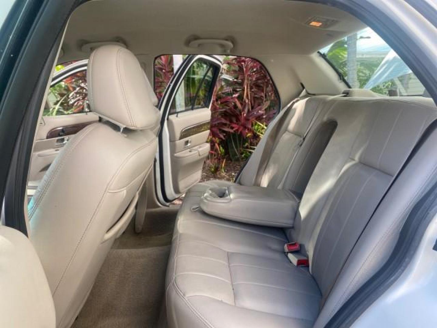 2007 Vibrant White /Med Light Stone Mercury Grand Marquis LS LOW MILES 62,205 (2MEFM75V17X) with an 4.6L SOHC FFV V8 Engine engine, Automatic transmission, located at 4701 North Dixie Hwy, Pompano Beach, FL, 33064, (954) 422-2889, 26.240938, -80.123474 - OUR WEBPAGE FLORIDACARS1.COM HAS OVER 100 PHOTOS AND FREE CARFAX LINK 2007 MERCURY GRAND MARQUIS LS VIN: 2MEFM75V17X635847 2 M E F M 7 5 V 1 7 X 6 3 5 8 4 7 SEDAN 4 DR 4.6L V8 F SOHC FLEX FUEL REAR WHEEL DRIVE Features ABS Brakes Air Conditioning Alloy Wheels AM/FM Stereo Automatic Transmission Cass - Photo#14