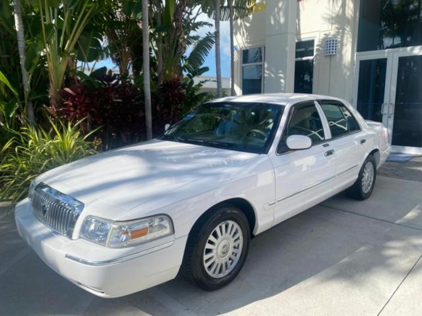 2007 Vibrant White /Med Light Stone Mercury Grand Marquis LS LOW MILES 62,205 (2MEFM75V17X) with an 4.6L SOHC FFV V8 Engine engine, Automatic transmission, located at 4701 North Dixie Hwy, Pompano Beach, FL, 33064, (954) 422-2889, 26.240938, -80.123474 - OUR WEBPAGE FLORIDACARS1.COM HAS OVER 100 PHOTOS AND FREE CARFAX LINK 2007 MERCURY GRAND MARQUIS LS VIN: 2MEFM75V17X635847 2 M E F M 7 5 V 1 7 X 6 3 5 8 4 7 SEDAN 4 DR 4.6L V8 F SOHC FLEX FUEL REAR WHEEL DRIVE Features ABS Brakes Air Conditioning Alloy Wheels AM/FM Stereo Automatic Transmission Cass - Photo#30