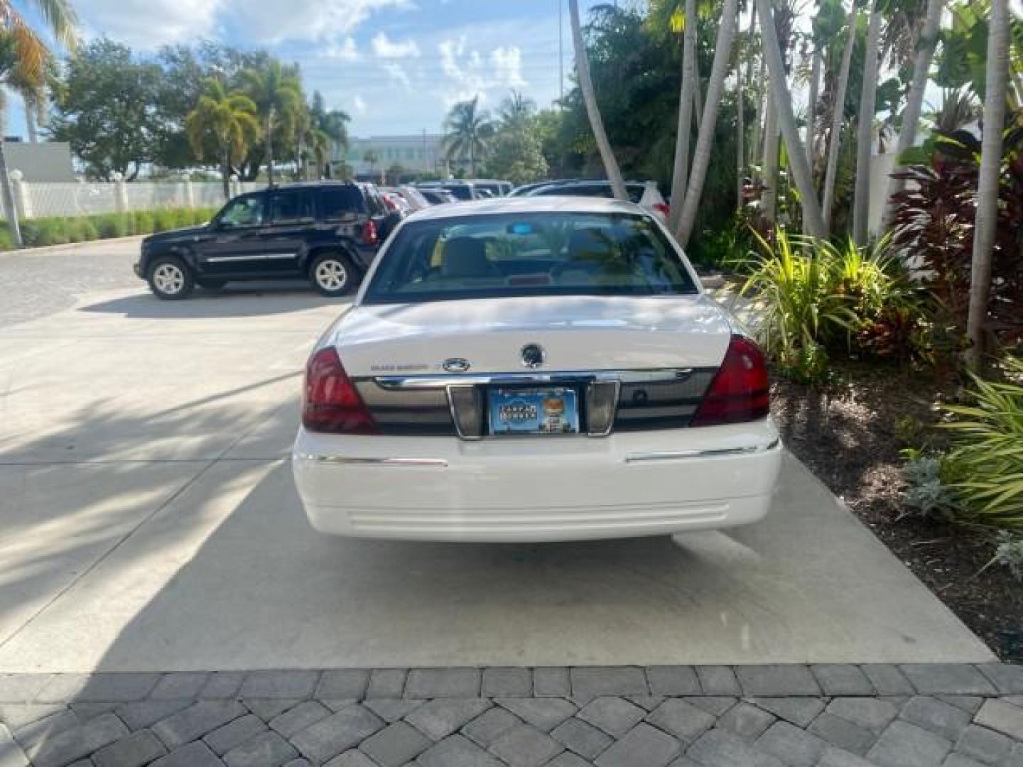2007 Vibrant White /Med Light Stone Mercury Grand Marquis LS LOW MILES 62,205 (2MEFM75V17X) with an 4.6L SOHC FFV V8 Engine engine, Automatic transmission, located at 4701 North Dixie Hwy, Pompano Beach, FL, 33064, (954) 422-2889, 26.240938, -80.123474 - OUR WEBPAGE FLORIDACARS1.COM HAS OVER 100 PHOTOS AND FREE CARFAX LINK 2007 MERCURY GRAND MARQUIS LS VIN: 2MEFM75V17X635847 2 M E F M 7 5 V 1 7 X 6 3 5 8 4 7 SEDAN 4 DR 4.6L V8 F SOHC FLEX FUEL REAR WHEEL DRIVE Features ABS Brakes Air Conditioning Alloy Wheels AM/FM Stereo Automatic Transmission Cass - Photo#35