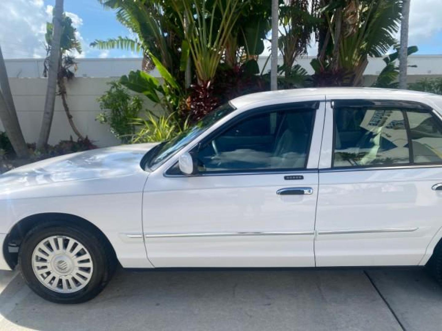 2007 Vibrant White /Med Light Stone Mercury Grand Marquis LS LOW MILES 62,205 (2MEFM75V17X) with an 4.6L SOHC FFV V8 Engine engine, Automatic transmission, located at 4701 North Dixie Hwy, Pompano Beach, FL, 33064, (954) 422-2889, 26.240938, -80.123474 - OUR WEBPAGE FLORIDACARS1.COM HAS OVER 100 PHOTOS AND FREE CARFAX LINK 2007 MERCURY GRAND MARQUIS LS VIN: 2MEFM75V17X635847 2 M E F M 7 5 V 1 7 X 6 3 5 8 4 7 SEDAN 4 DR 4.6L V8 F SOHC FLEX FUEL REAR WHEEL DRIVE Features ABS Brakes Air Conditioning Alloy Wheels AM/FM Stereo Automatic Transmission Cass - Photo#37