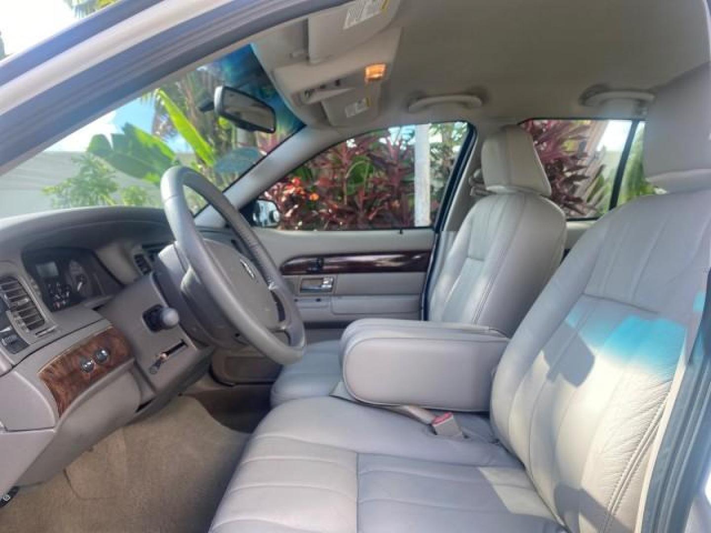 2007 Vibrant White /Med Light Stone Mercury Grand Marquis LS LOW MILES 62,205 (2MEFM75V17X) with an 4.6L SOHC FFV V8 Engine engine, Automatic transmission, located at 4701 North Dixie Hwy, Pompano Beach, FL, 33064, (954) 422-2889, 26.240938, -80.123474 - OUR WEBPAGE FLORIDACARS1.COM HAS OVER 100 PHOTOS AND FREE CARFAX LINK 2007 MERCURY GRAND MARQUIS LS VIN: 2MEFM75V17X635847 2 M E F M 7 5 V 1 7 X 6 3 5 8 4 7 SEDAN 4 DR 4.6L V8 F SOHC FLEX FUEL REAR WHEEL DRIVE Features ABS Brakes Air Conditioning Alloy Wheels AM/FM Stereo Automatic Transmission Cass - Photo#45