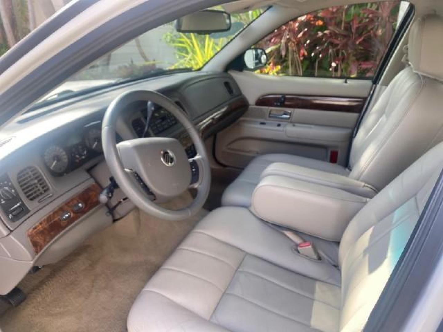 2007 Vibrant White /Med Light Stone Mercury Grand Marquis LS LOW MILES 62,205 (2MEFM75V17X) with an 4.6L SOHC FFV V8 Engine engine, Automatic transmission, located at 4701 North Dixie Hwy, Pompano Beach, FL, 33064, (954) 422-2889, 26.240938, -80.123474 - OUR WEBPAGE FLORIDACARS1.COM HAS OVER 100 PHOTOS AND FREE CARFAX LINK 2007 MERCURY GRAND MARQUIS LS VIN: 2MEFM75V17X635847 2 M E F M 7 5 V 1 7 X 6 3 5 8 4 7 SEDAN 4 DR 4.6L V8 F SOHC FLEX FUEL REAR WHEEL DRIVE Features ABS Brakes Air Conditioning Alloy Wheels AM/FM Stereo Automatic Transmission Cass - Photo#46