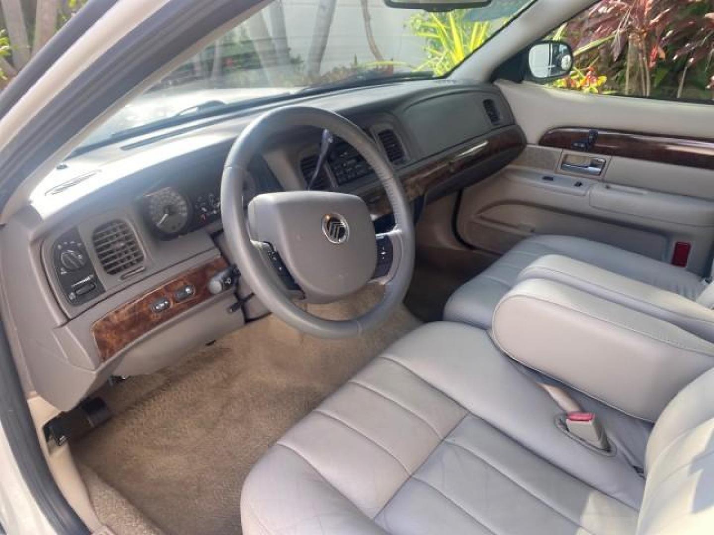 2007 Vibrant White /Med Light Stone Mercury Grand Marquis LS LOW MILES 62,205 (2MEFM75V17X) with an 4.6L SOHC FFV V8 Engine engine, Automatic transmission, located at 4701 North Dixie Hwy, Pompano Beach, FL, 33064, (954) 422-2889, 26.240938, -80.123474 - OUR WEBPAGE FLORIDACARS1.COM HAS OVER 100 PHOTOS AND FREE CARFAX LINK 2007 MERCURY GRAND MARQUIS LS VIN: 2MEFM75V17X635847 2 M E F M 7 5 V 1 7 X 6 3 5 8 4 7 SEDAN 4 DR 4.6L V8 F SOHC FLEX FUEL REAR WHEEL DRIVE Features ABS Brakes Air Conditioning Alloy Wheels AM/FM Stereo Automatic Transmission Cass - Photo#47