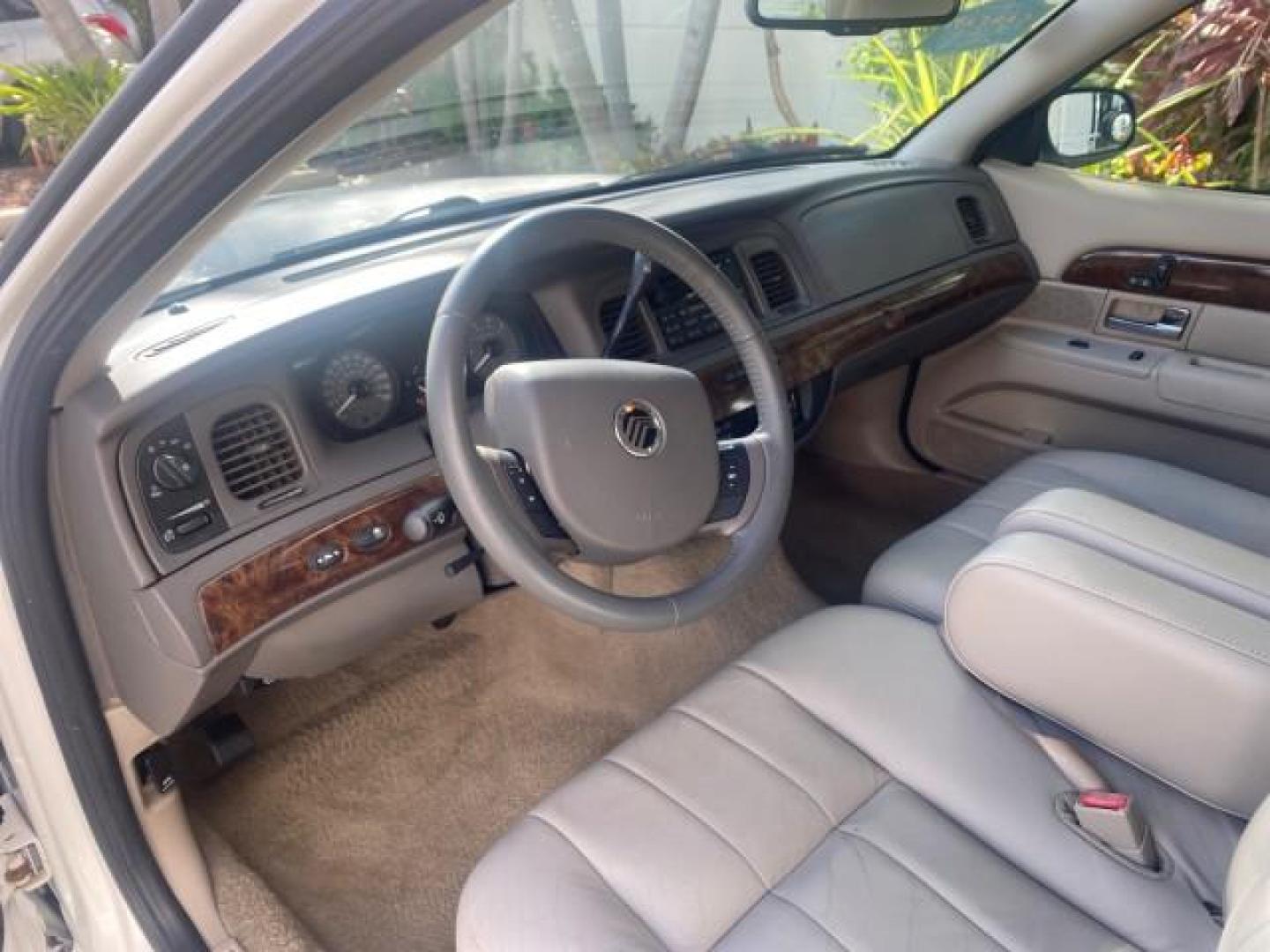 2007 Vibrant White /Med Light Stone Mercury Grand Marquis LS LOW MILES 62,205 (2MEFM75V17X) with an 4.6L SOHC FFV V8 Engine engine, Automatic transmission, located at 4701 North Dixie Hwy, Pompano Beach, FL, 33064, (954) 422-2889, 26.240938, -80.123474 - OUR WEBPAGE FLORIDACARS1.COM HAS OVER 100 PHOTOS AND FREE CARFAX LINK 2007 MERCURY GRAND MARQUIS LS VIN: 2MEFM75V17X635847 2 M E F M 7 5 V 1 7 X 6 3 5 8 4 7 SEDAN 4 DR 4.6L V8 F SOHC FLEX FUEL REAR WHEEL DRIVE Features ABS Brakes Air Conditioning Alloy Wheels AM/FM Stereo Automatic Transmission Cass - Photo#48