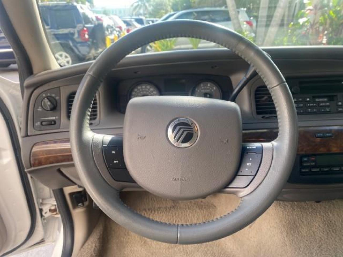 2007 Vibrant White /Med Light Stone Mercury Grand Marquis LS LOW MILES 62,205 (2MEFM75V17X) with an 4.6L SOHC FFV V8 Engine engine, Automatic transmission, located at 4701 North Dixie Hwy, Pompano Beach, FL, 33064, (954) 422-2889, 26.240938, -80.123474 - OUR WEBPAGE FLORIDACARS1.COM HAS OVER 100 PHOTOS AND FREE CARFAX LINK 2007 MERCURY GRAND MARQUIS LS VIN: 2MEFM75V17X635847 2 M E F M 7 5 V 1 7 X 6 3 5 8 4 7 SEDAN 4 DR 4.6L V8 F SOHC FLEX FUEL REAR WHEEL DRIVE Features ABS Brakes Air Conditioning Alloy Wheels AM/FM Stereo Automatic Transmission Cass - Photo#49